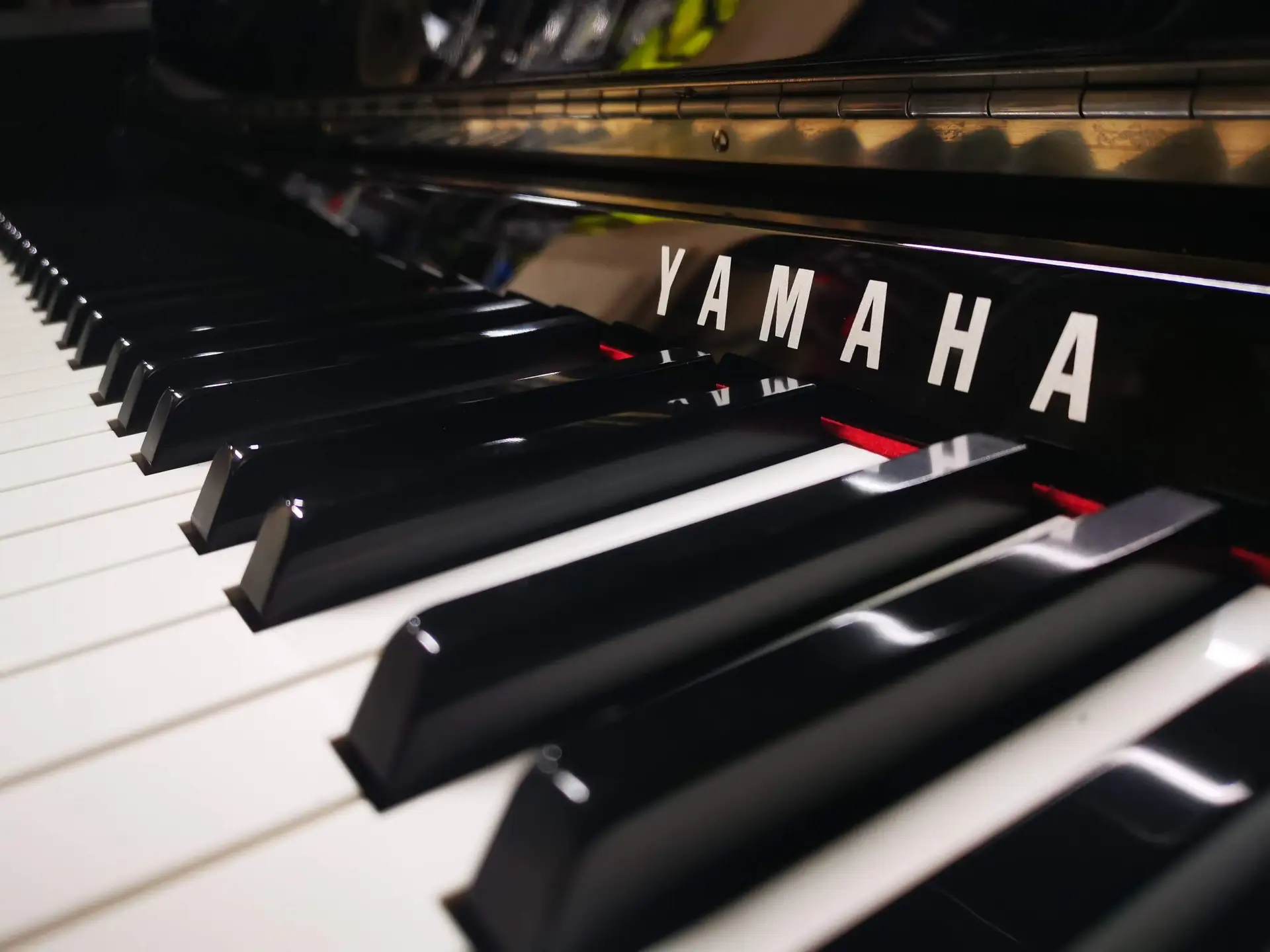 Close up of black and white Yamaha keys for replacement