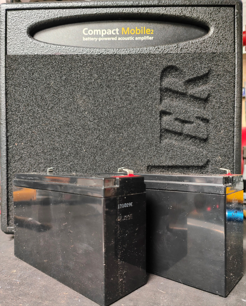 Aer compact mobile lead acid batteries in front of amplifier